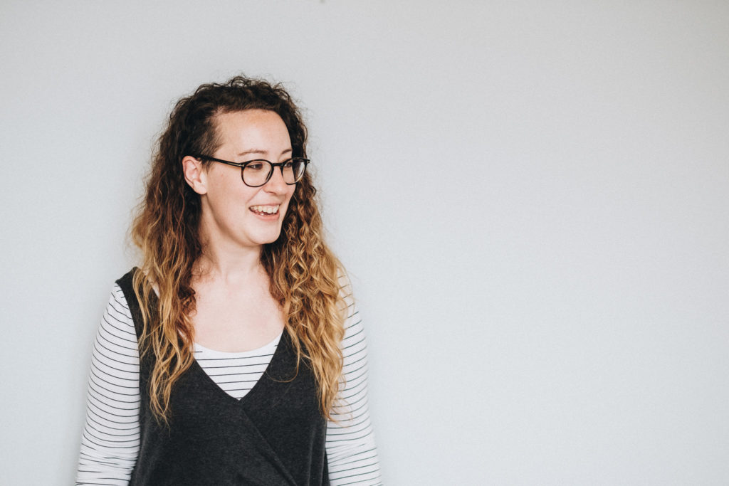 woman smiling during her personal brand photoshoot in leamington spa